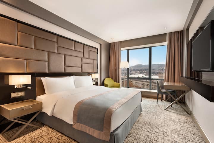 Guest room at the Wyndham Grand Tbilisi in Tbilisi, Other than US/Canada