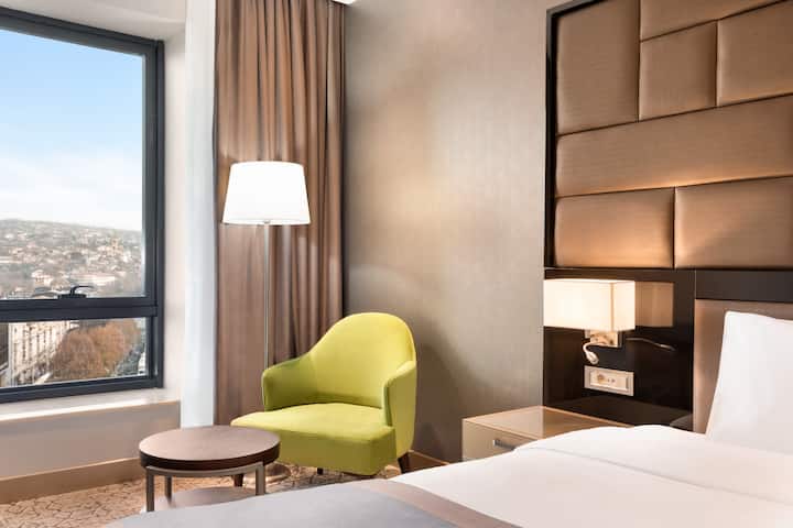 Guest room at the Wyndham Grand Tbilisi in Tbilisi, Other than US/Canada