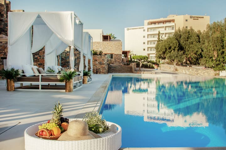 Pool bar at the Wyndham Grand Crete Mirabello Bay in Agios Nikolaos, Other than US/Canada