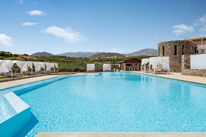 Pool bar at the Wyndham Grand Crete Mirabello Bay in Agios Nikolaos, Other than US/Canada