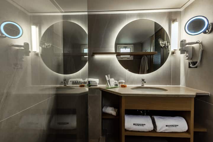 Guest room bath at the Wyndham Grand Crete Mirabello Bay in Agios Nikolaos, Other than US/Canada