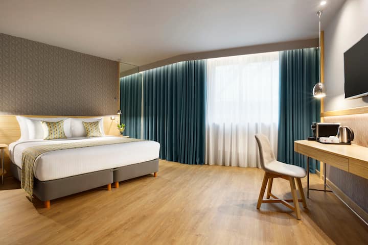 Guest room at the Wyndham Grand Athens in Athens, Other than US/Canada