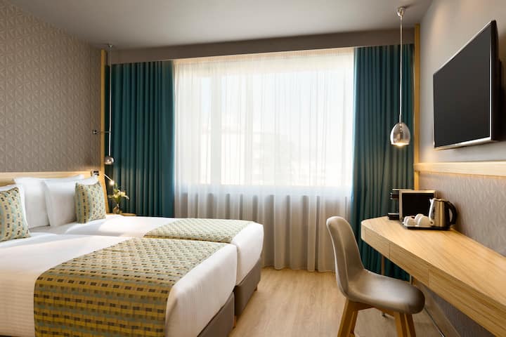 Guest room at the Wyndham Grand Athens in Athens, Other than US/Canada