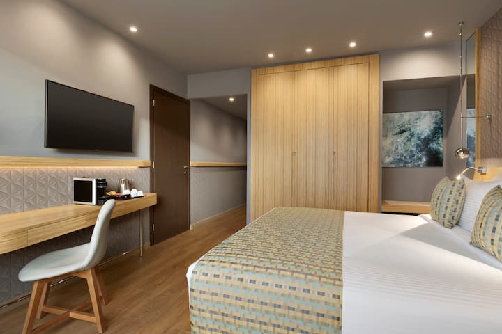 Guest room at the Wyndham Grand Athens in Athens, Other than US/Canada