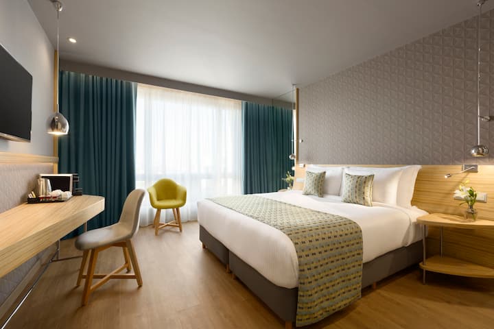 Guest room at the Wyndham Grand Athens in Athens, Other than US/Canada
