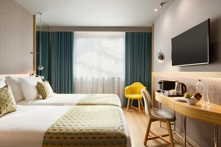 Guest room at the Wyndham Grand Athens in Athens, Other than US/Canada