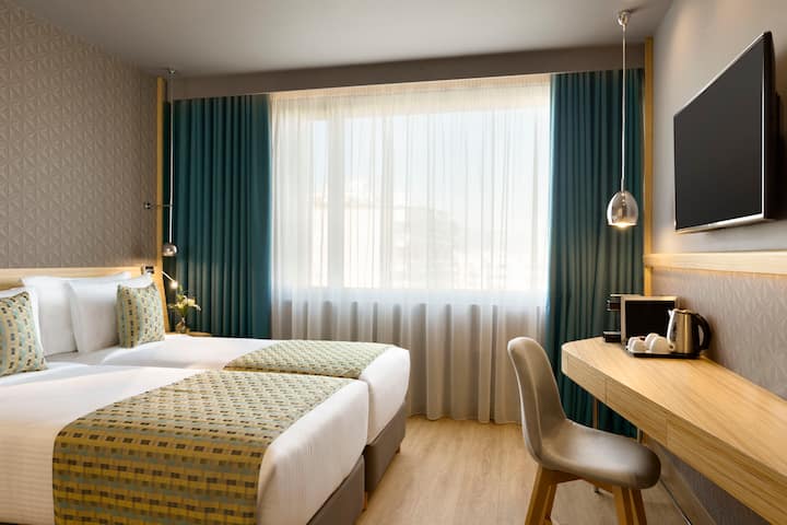 Guest room at the Wyndham Grand Athens in Athens, Other than US/Canada