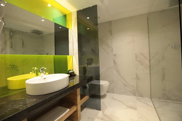 Guest room at the Wyndham Grand Athens in Athens, Other than US/Canada