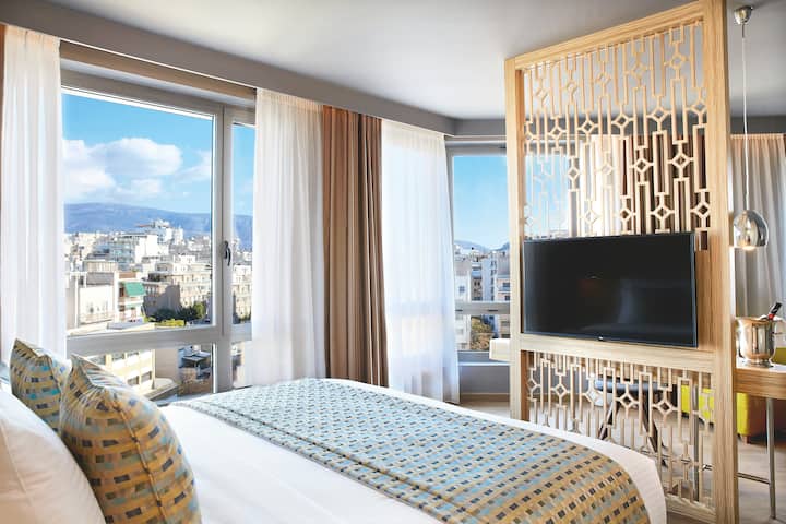 Guest room at the Wyndham Grand Athens in Athens, Other than US/Canada