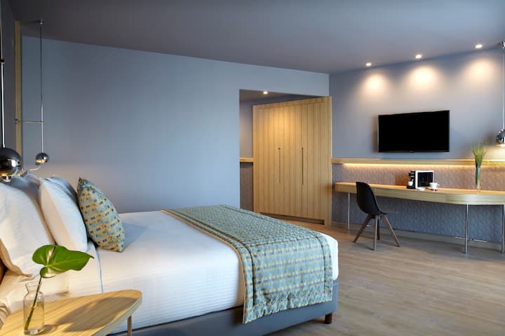 Guest room at the Wyndham Grand Athens in Athens, Other than US/Canada