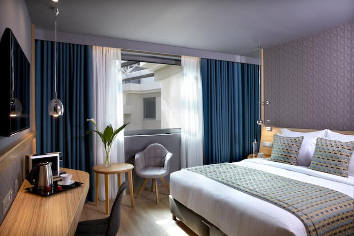 Guest room at the Wyndham Grand Athens in Athens, Other than US/Canada