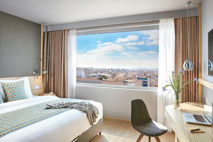 Guest room at the Wyndham Grand Athens in Athens, Other than US/Canada