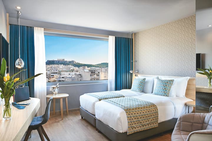 Guest room at the Wyndham Grand Athens in Athens, Other than US/Canada