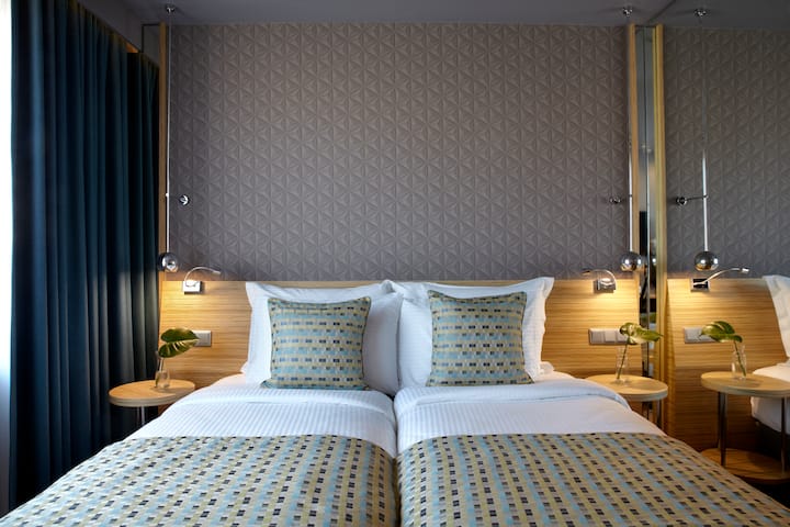 Guest room at the Wyndham Grand Athens in Athens, Other than US/Canada