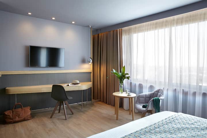 Guest room at the Wyndham Grand Athens in Athens, Other than US/Canada