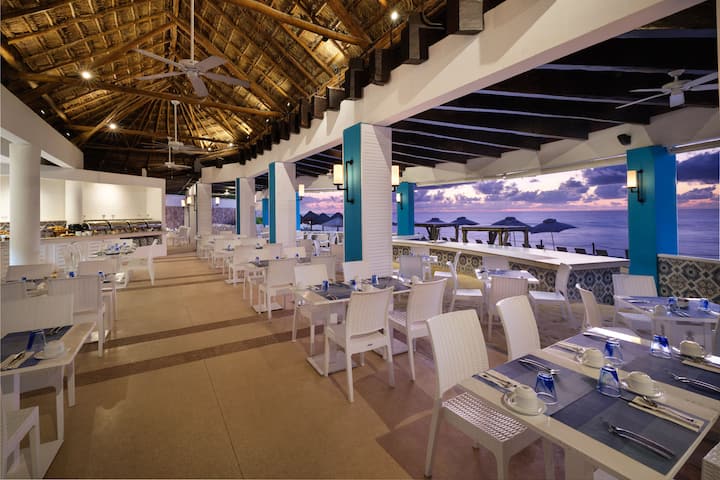 Wyndham Grand Cancun All Inclusive Resort & Villas restaurant breakfast area with seating in Cancun, Other than US/Canada