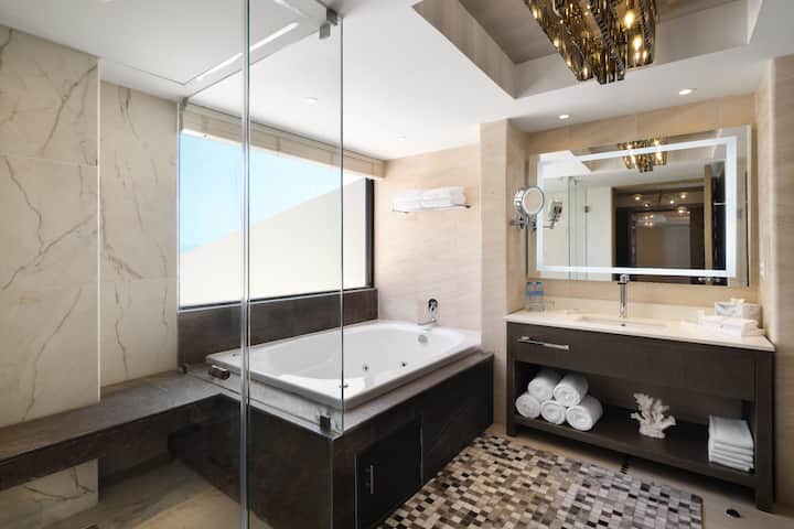 Guest room bath at the Wyndham Grand Cancun All Inclusive Resort & Villas in Cancun, Other than US/Canada