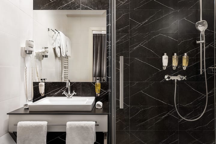 Guest room bath at the Wyndham Grand Krakow Old Town in Cracow, Other than US/Canada