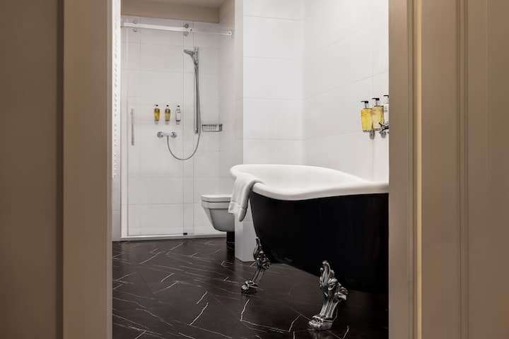 Guest room bath at the Wyndham Grand Krakow Old Town in Cracow, Other than US/Canada