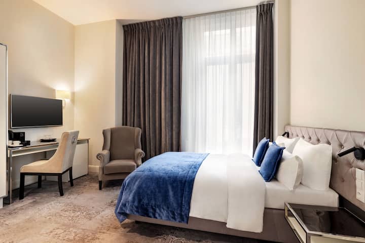 Guest room at the Wyndham Grand Krakow Old Town in Cracow, Other than US/Canada