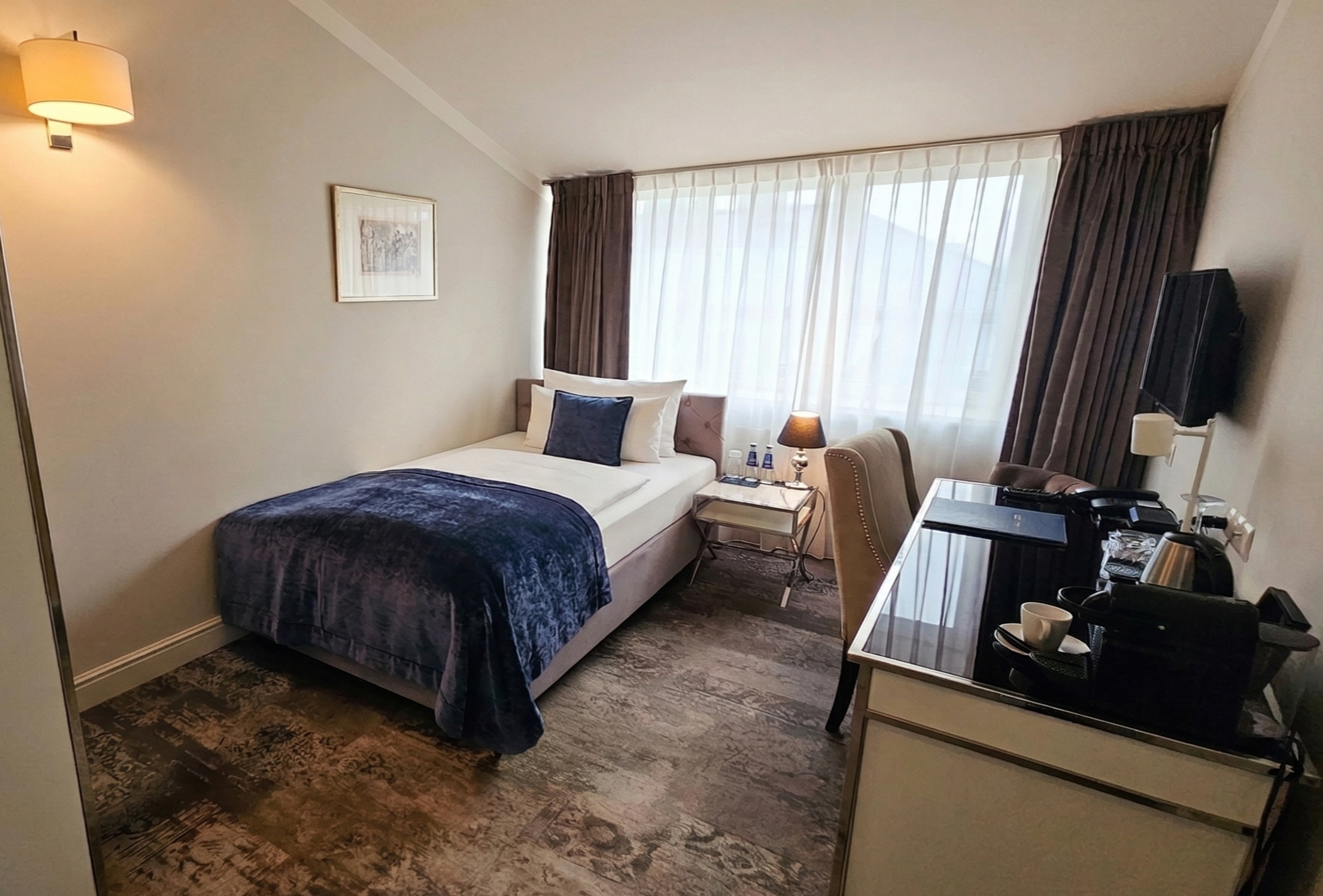 Guest room at the Wyndham Grand Krakow Old Town in Cracow, Other than US/Canada