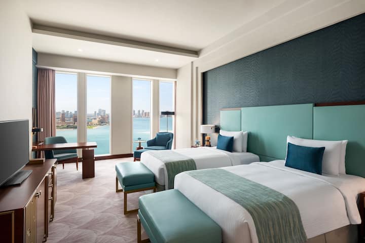 Guest room at the Wyndham Grand Doha West Bay Beach in Doha, Other than US/Canada