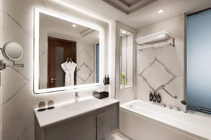 Guest room bath at the Wyndham Grand Doha West Bay Beach in Doha, Other than US/Canada