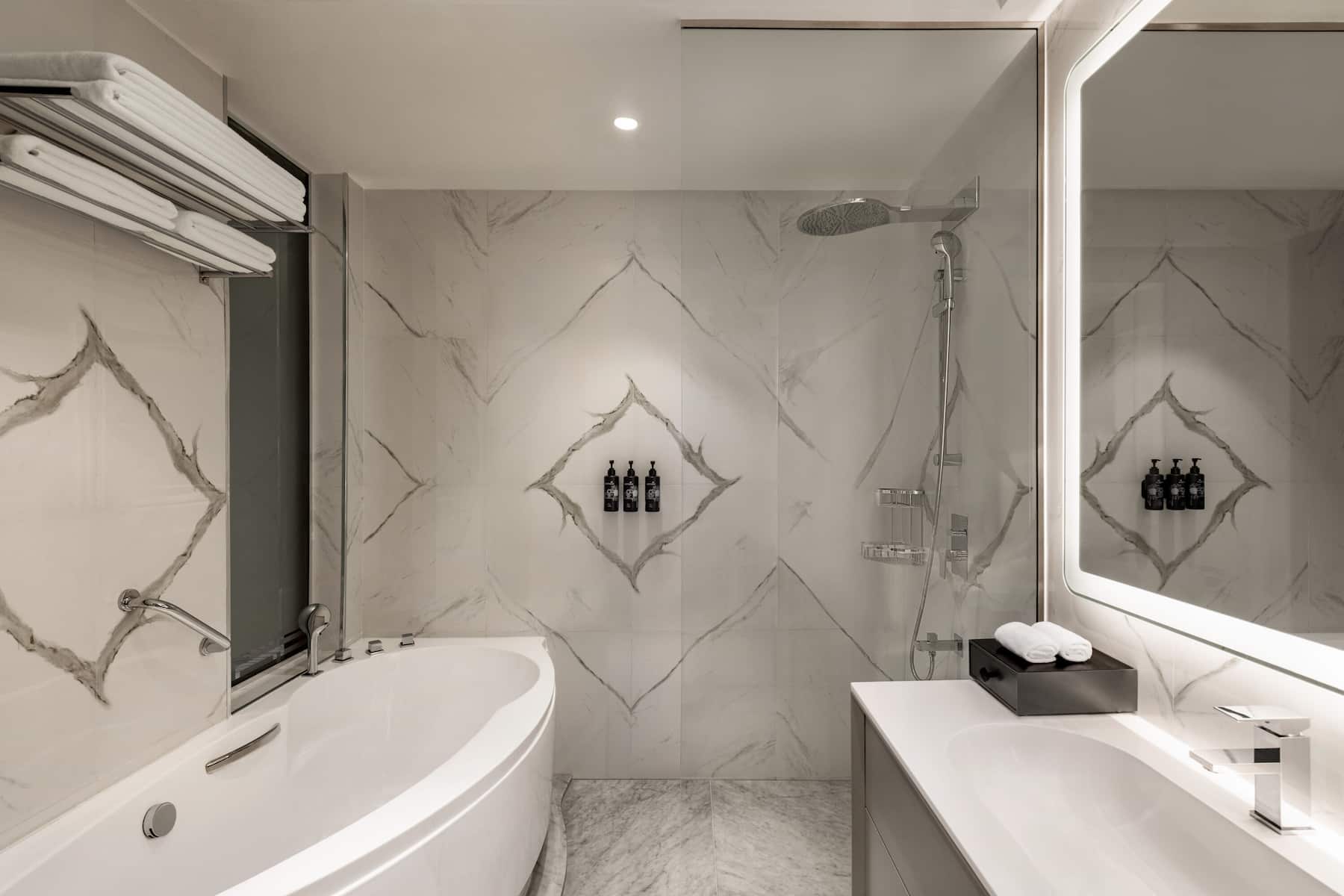 Guest room bath at the Wyndham Grand Doha West Bay Beach in Doha, Other than US/Canada