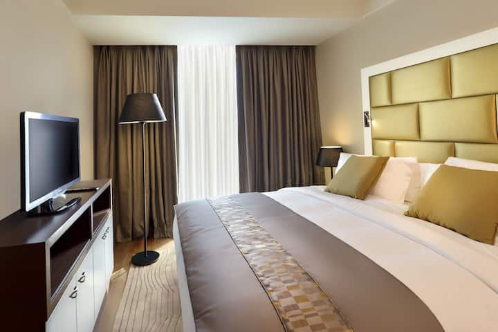Guest room at the Wyndham Grand Istanbul Europe in Istanbul, Other than US/Canada
