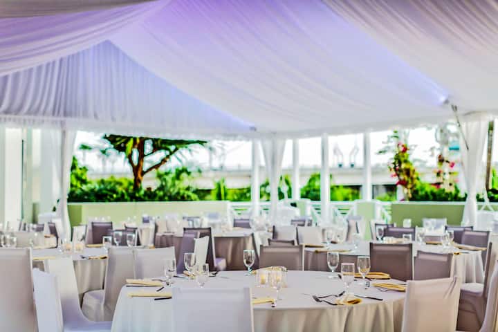 Wyndham Grand Jupiter at Harbourside Place ballroom banquet rounds in Jupiter, Florida