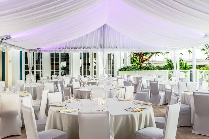 Wyndham Grand Jupiter at Harbourside Place ballroom banquet rounds in Jupiter, Florida