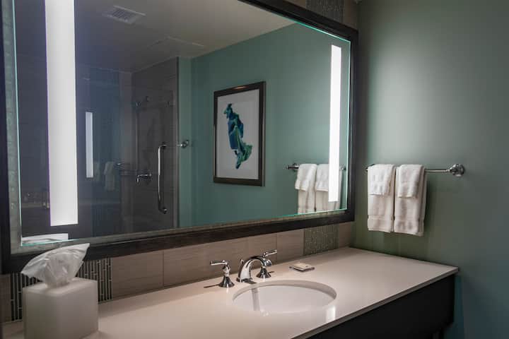 Guest room bath at the Wyndham Grand Jupiter at Harbourside Place in Jupiter, Florida