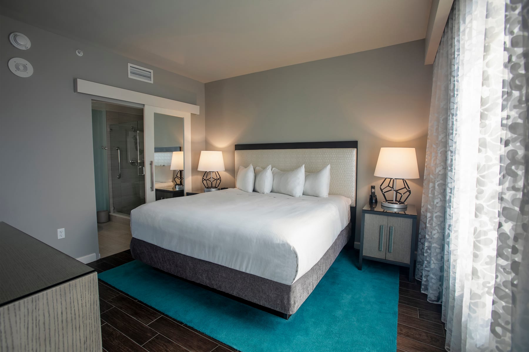 Guest room at the Wyndham Grand Jupiter at Harbourside Place in Jupiter, Florida