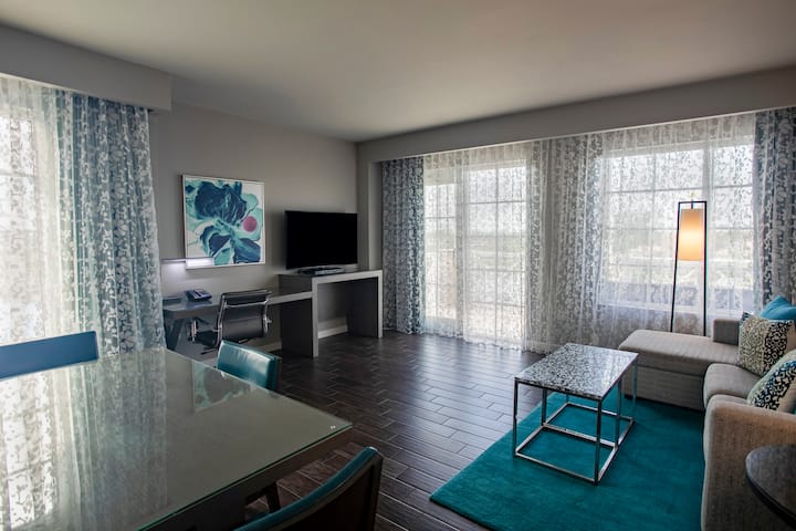 Guest room at the Wyndham Grand Jupiter at Harbourside Place in Jupiter, Florida