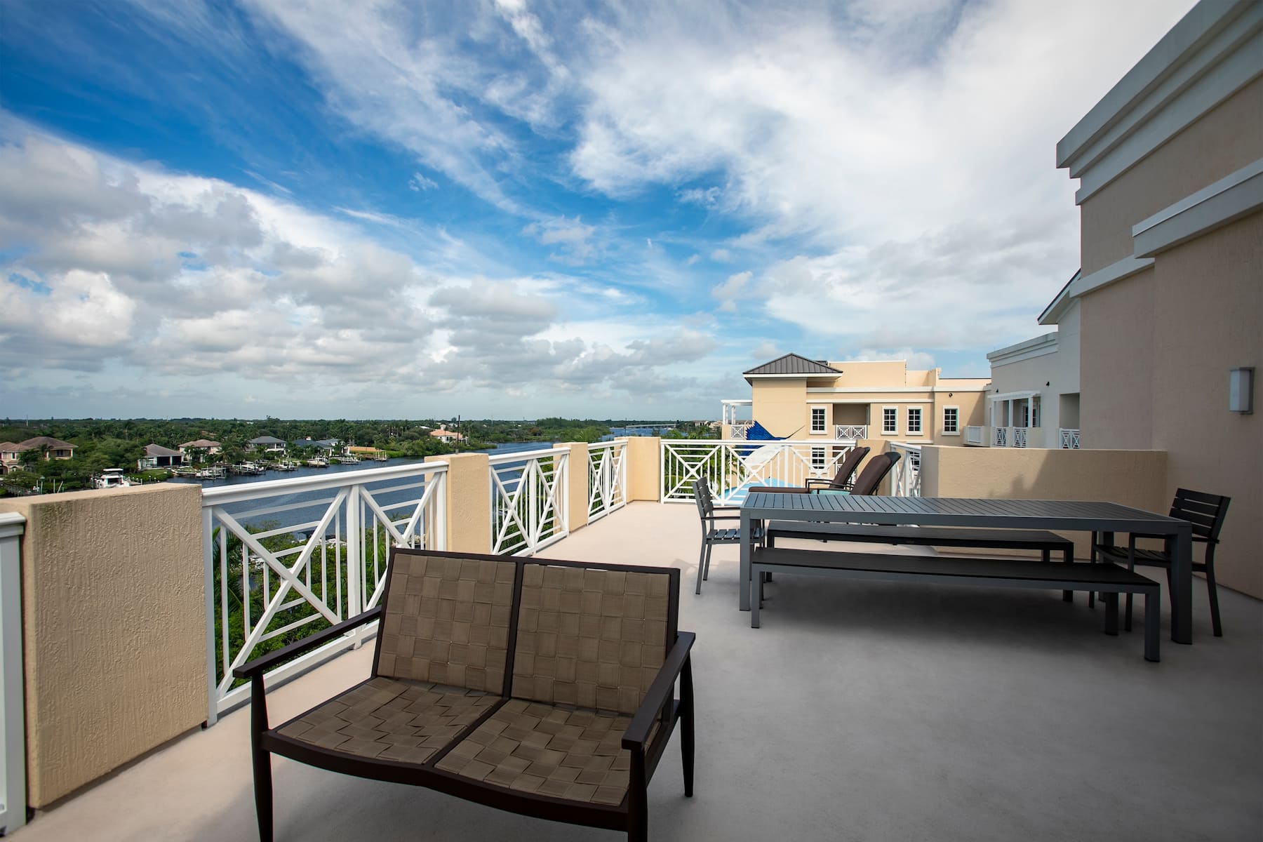 Guest room at the Wyndham Grand Jupiter at Harbourside Place in Jupiter, Florida