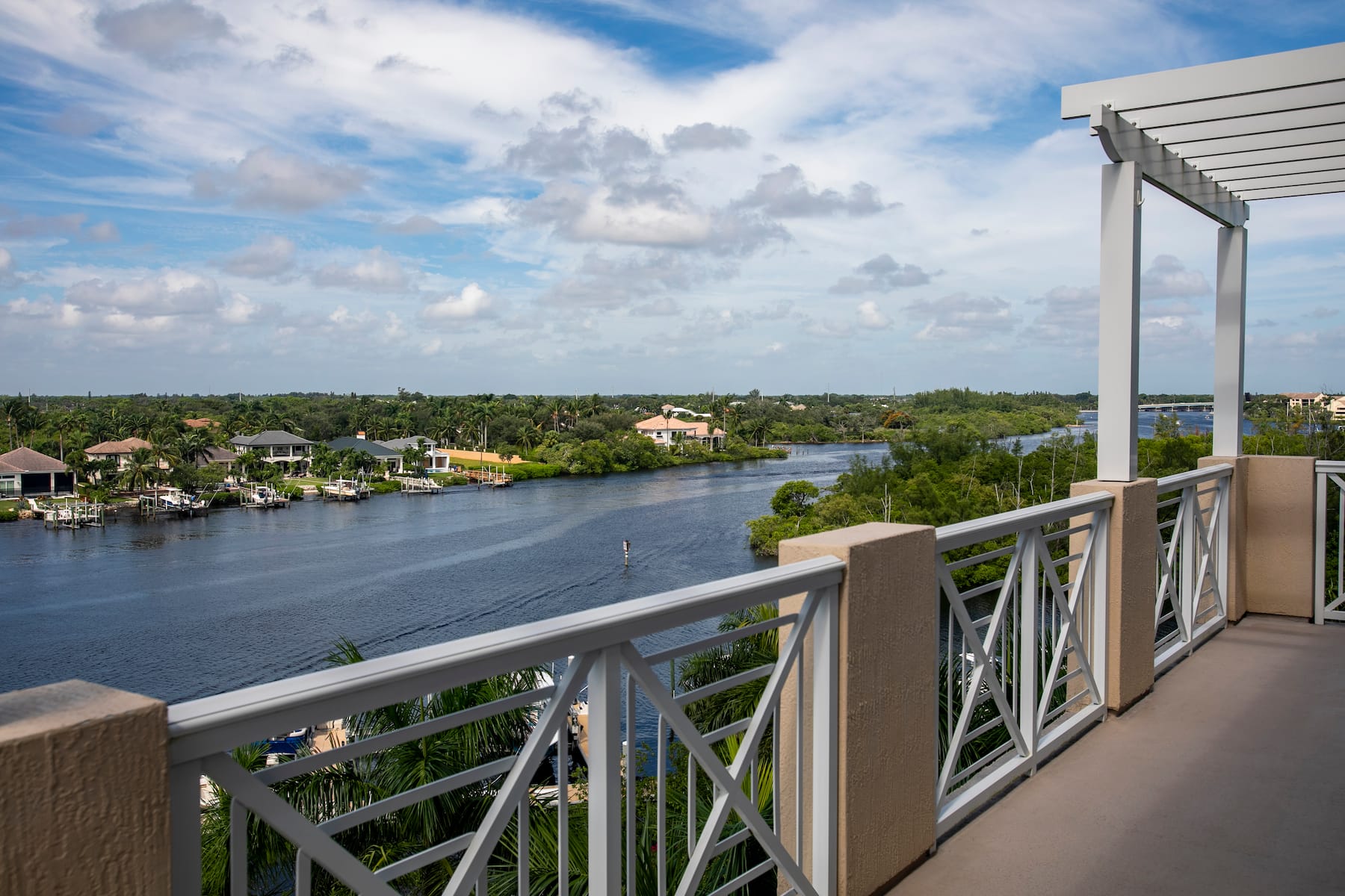 Guest room at the Wyndham Grand Jupiter at Harbourside Place in Jupiter, Florida
