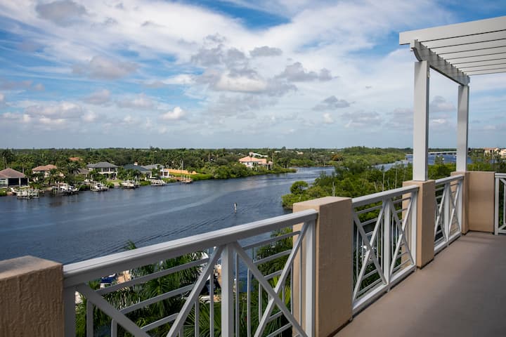Guest room at the Wyndham Grand Jupiter at Harbourside Place in Jupiter, Florida
