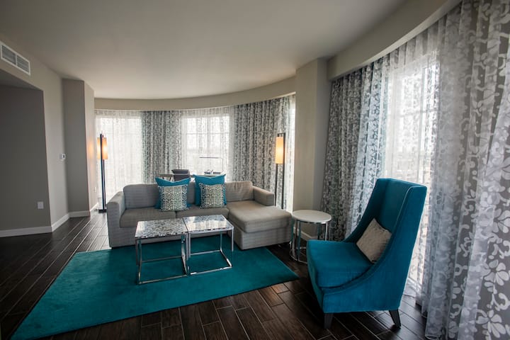 Guest room at the Wyndham Grand Jupiter at Harbourside Place in Jupiter, Florida