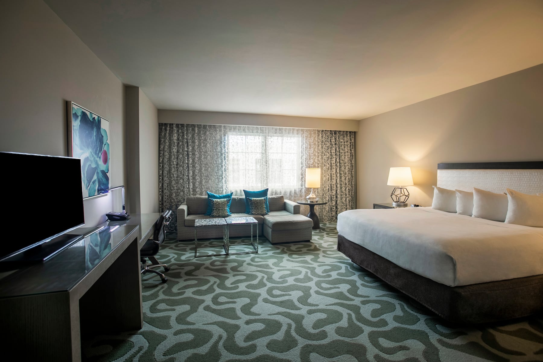Guest room at the Wyndham Grand Jupiter at Harbourside Place in Jupiter, Florida