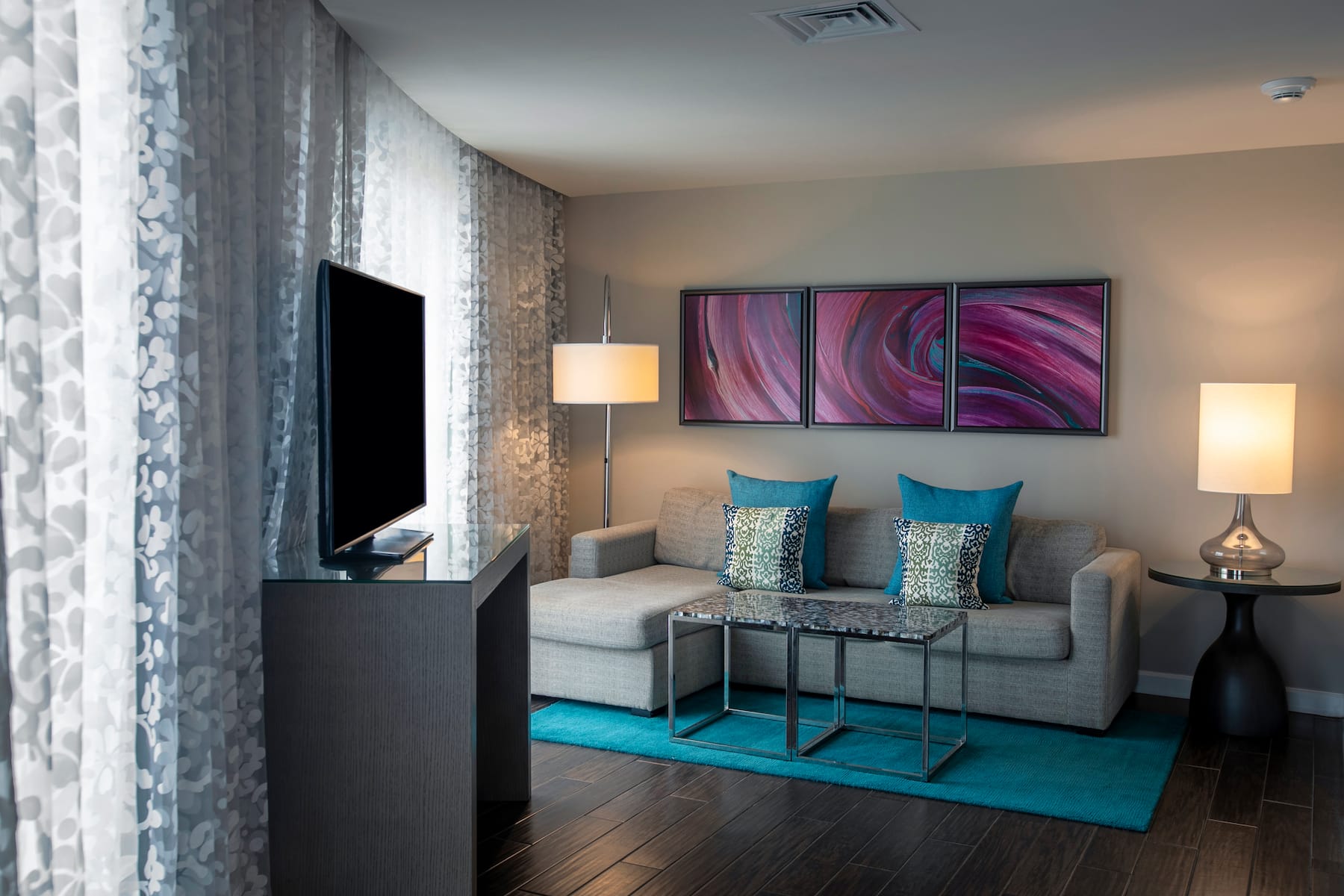 Guest room at the Wyndham Grand Jupiter at Harbourside Place in Jupiter, Florida