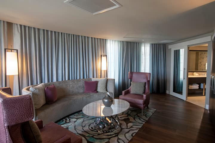 Guest room at the Wyndham Grand Jupiter at Harbourside Place in Jupiter, Florida