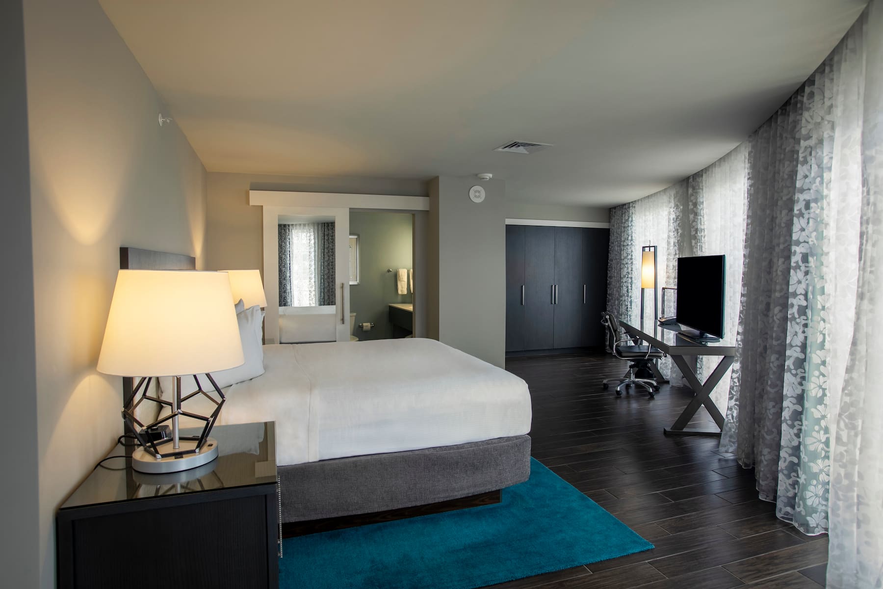 Guest room at the Wyndham Grand Jupiter at Harbourside Place in Jupiter, Florida
