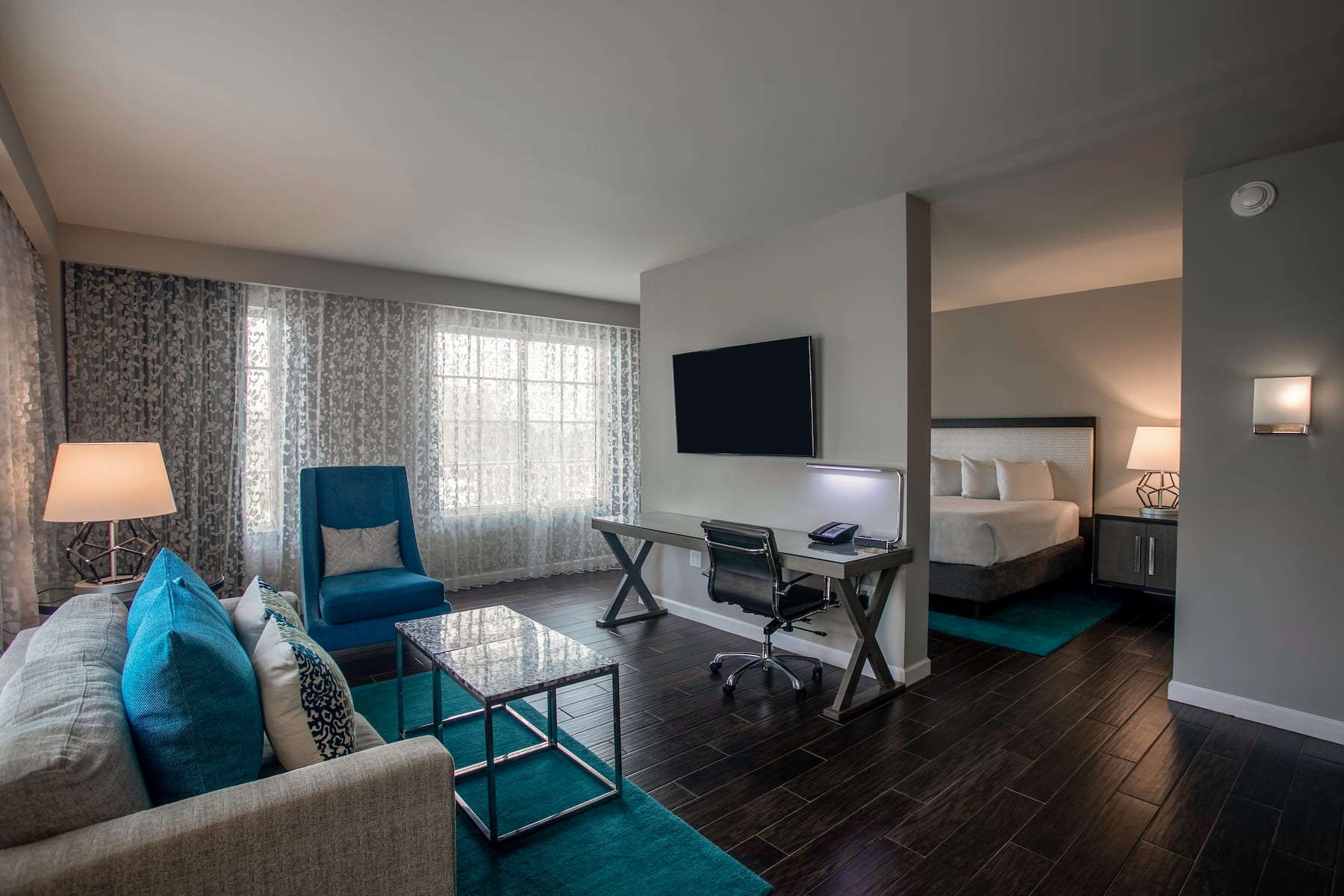 Guest room at the Wyndham Grand Jupiter at Harbourside Place in Jupiter, Florida