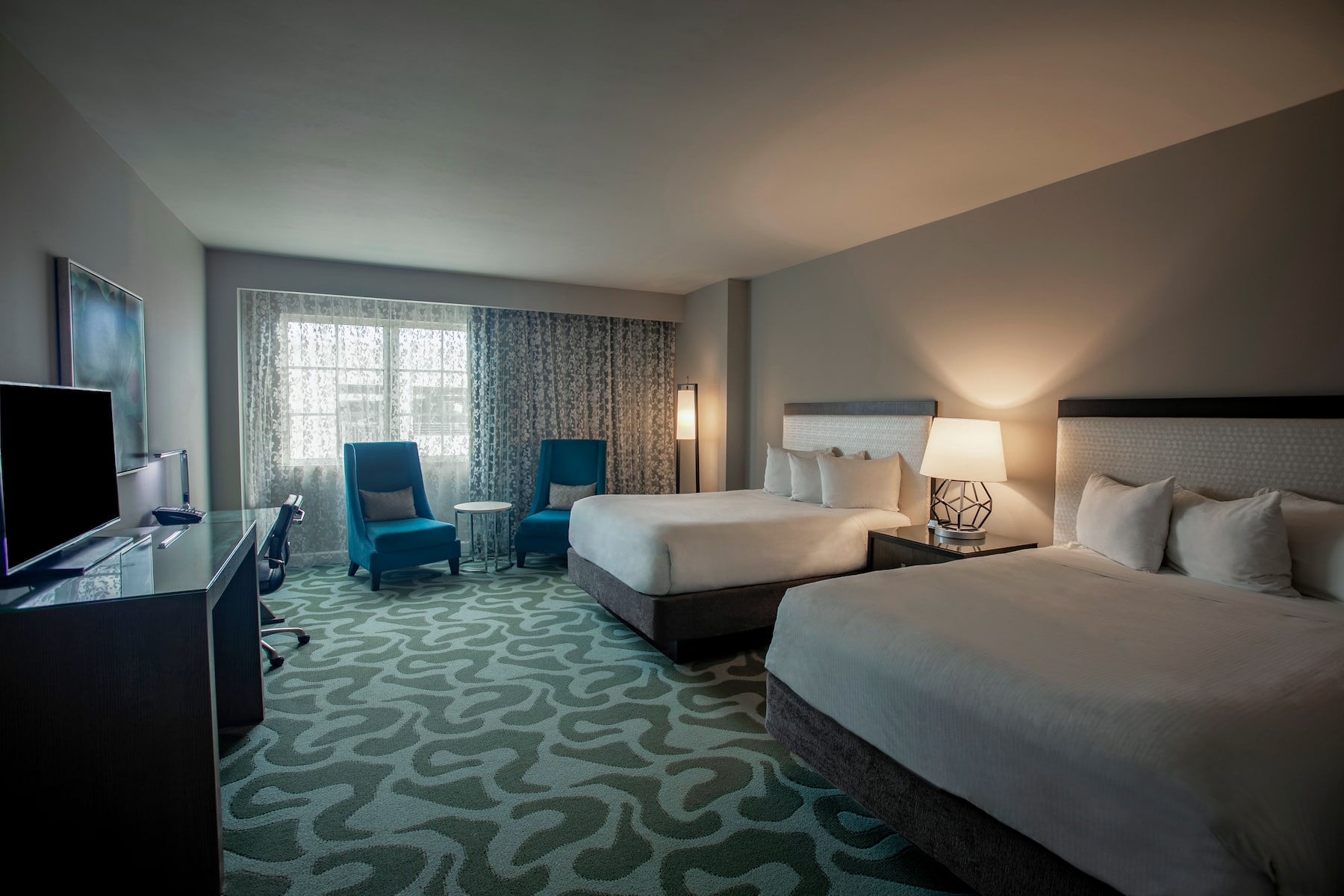 Guest room at the Wyndham Grand Jupiter at Harbourside Place in Jupiter, Florida