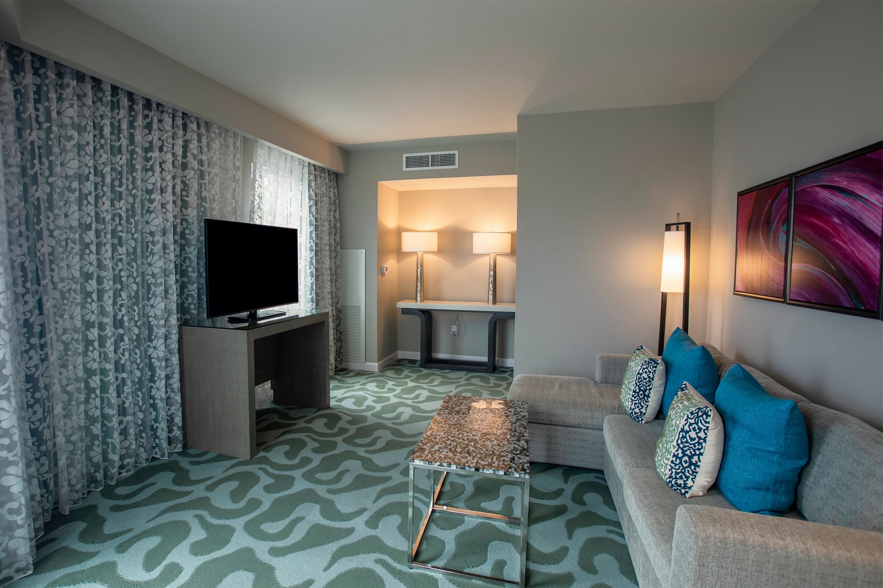 Guest room at the Wyndham Grand Jupiter at Harbourside Place in Jupiter, Florida