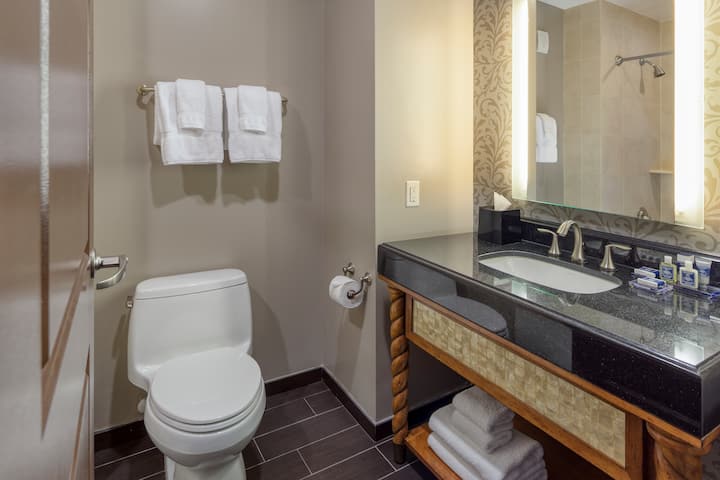 Guest room bath at the Wyndham Grand Orlando Resort Bonnet Creek in Orlando, Florida