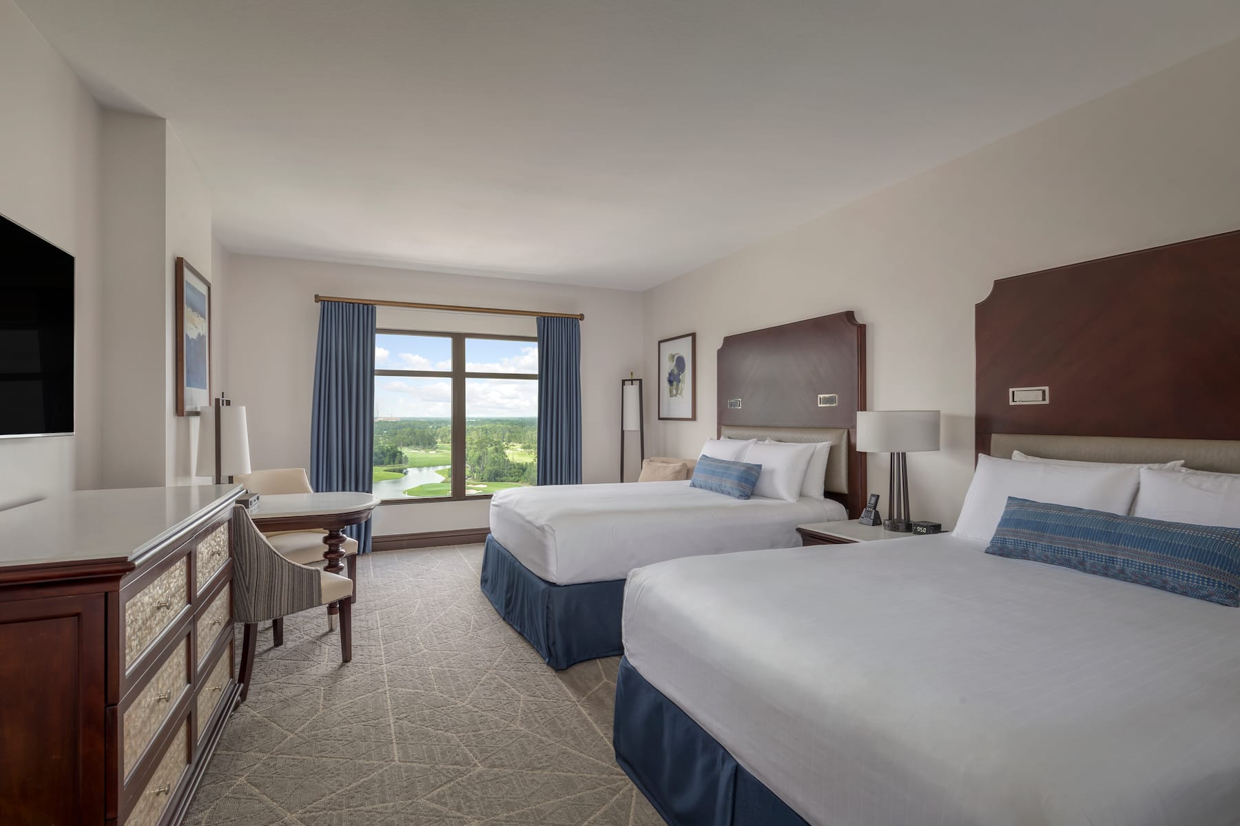 Guest room at the Wyndham Grand Orlando Resort Bonnet Creek in Orlando, Florida