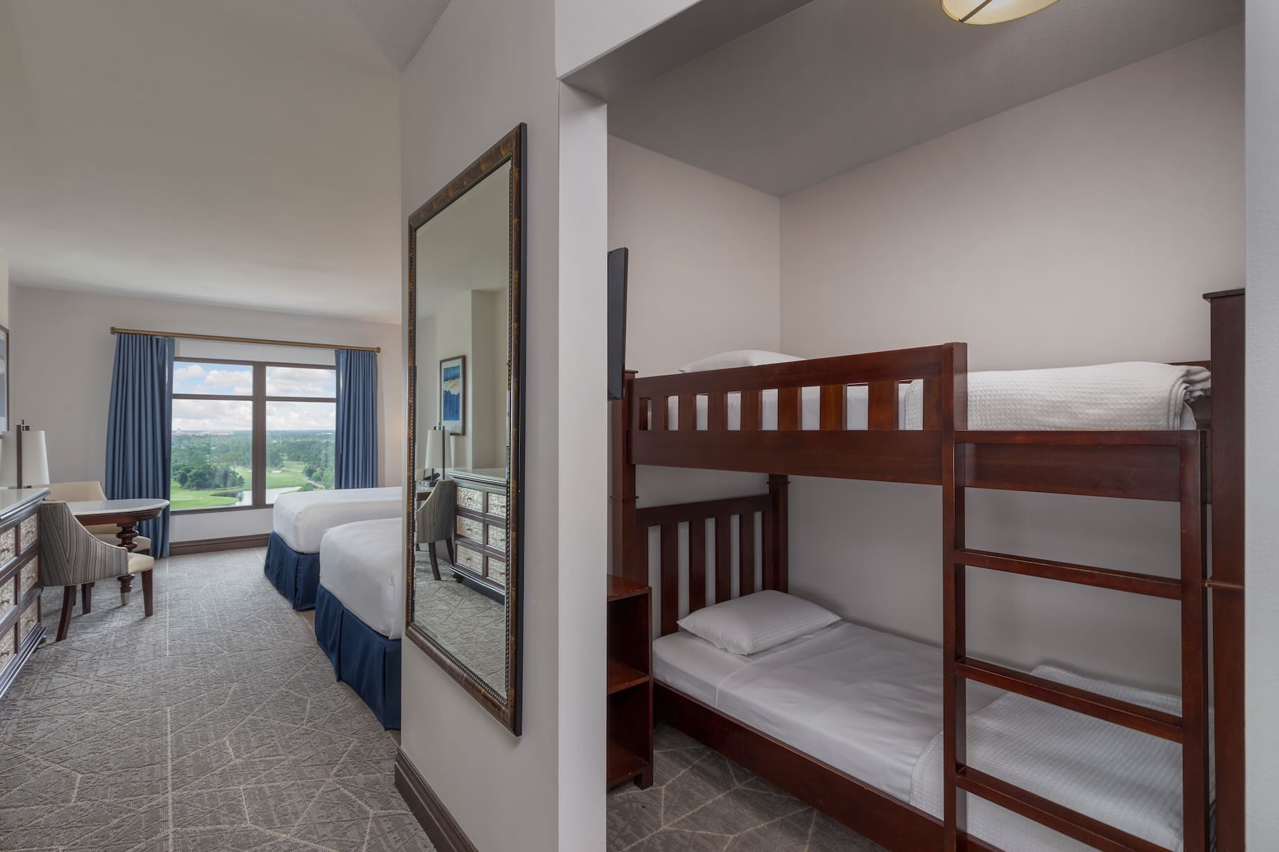 Guest room at the Wyndham Grand Orlando Resort Bonnet Creek in Orlando, Florida