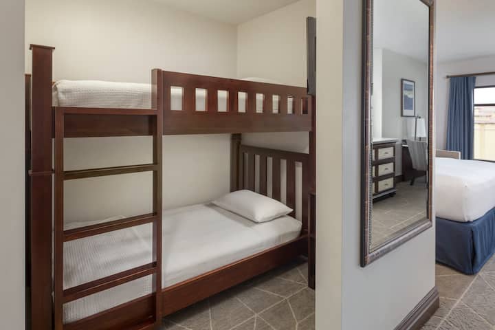 Guest room at the Wyndham Grand Orlando Resort Bonnet Creek in Orlando, Florida
