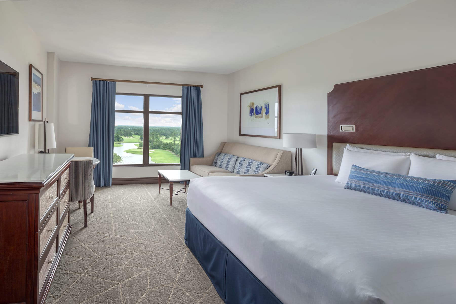 Guest room at the Wyndham Grand Orlando Resort Bonnet Creek in Orlando, Florida
